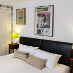 Hotel Room with poster on the wall